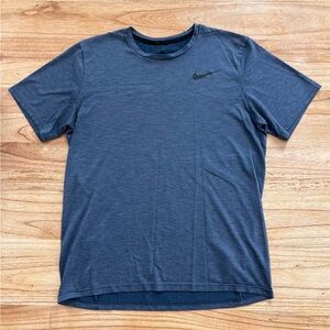Blue Nike athletic shirt